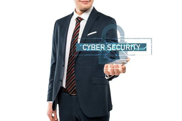 Cropped view of young man in suit gesturing near cyber security lettering on white — Stock Photo