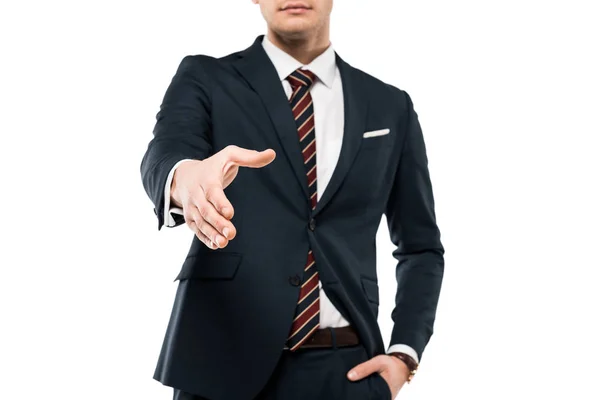 Cropped view of businessman gesturing while standing with hand in pocket isolated on white — Stock Photo