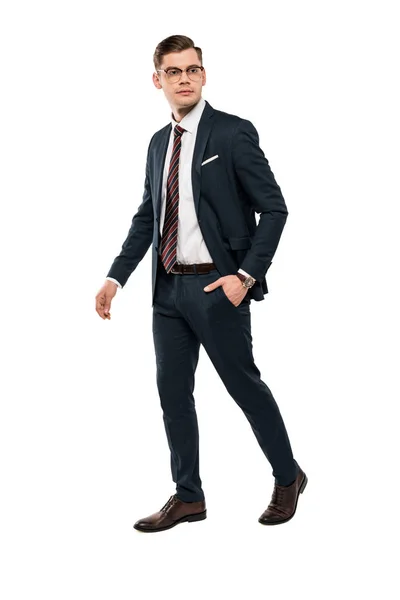 Handsome businessman standing with hand in pocket isolated on white — Stock Photo