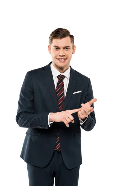 Happy businessman looking at camera and gesturing isolated on white — Stock Photo