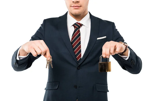 Cropped view of businessman holding keys and padlock isolated on white — Stock Photo