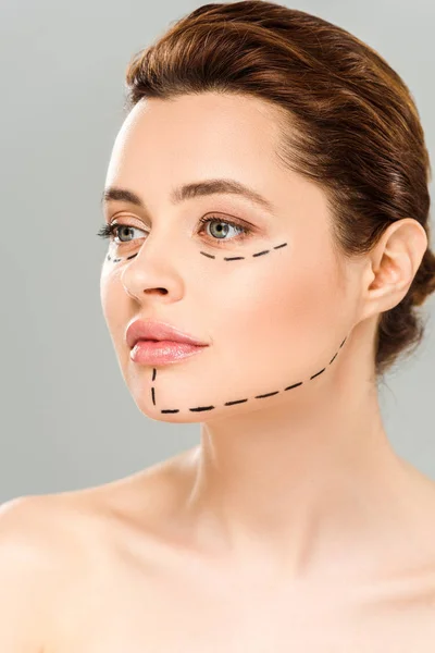 Naked and beautiful woman with marks on face isolated on grey — Stock Photo
