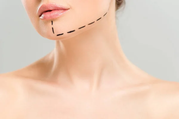 Cropped view of naked woman with marks on face isolated on grey — Stock Photo
