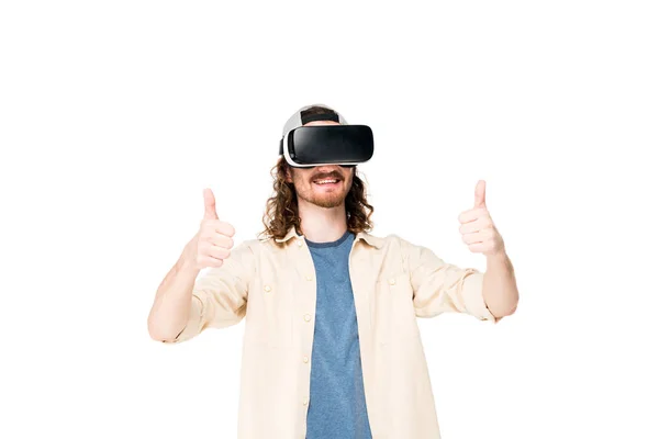 Young man using VR headset showing thumb up at camera isolated on white — Stock Photo