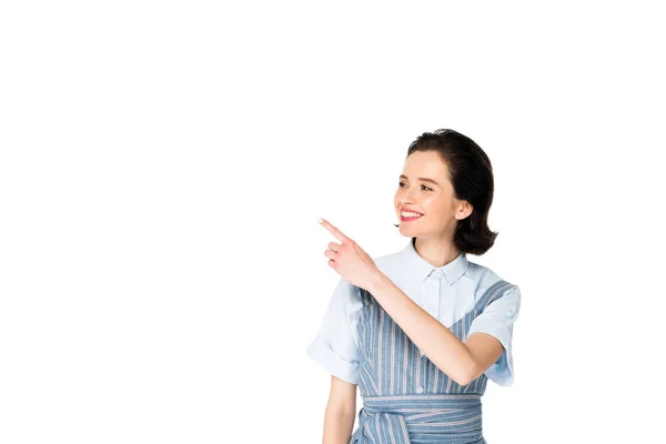 Menina bonita apontando com o dedo isolado no branco — Fotografia de Stock