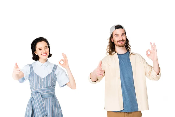 Two people pointing with fingers at camera and showing OK signs isolated on white — Stock Photo