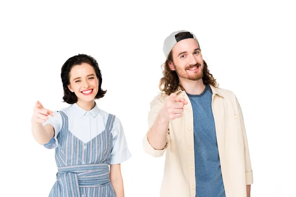 Two people smiling and pointing with fingers at camera isolated on white — Stock Photo