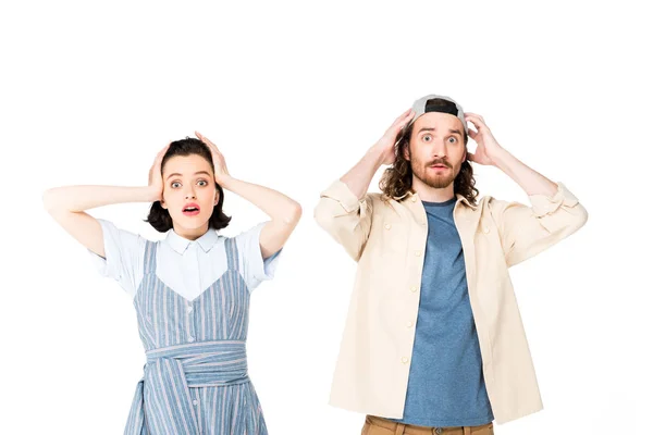 Shocked two people holding heads with hands isolated on white — Stock Photo