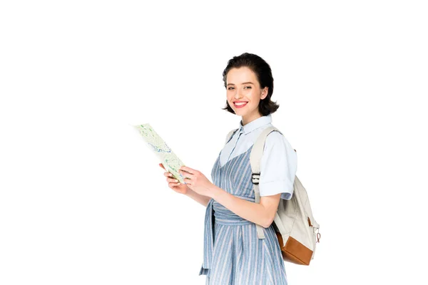 Girl holding map and smiling at camera isolated on white — Stock Photo