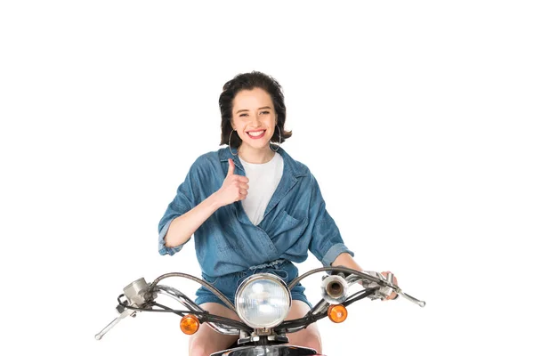 Front view of girl sitting on scooter and showing thumb up isoalted on white — Stock Photo