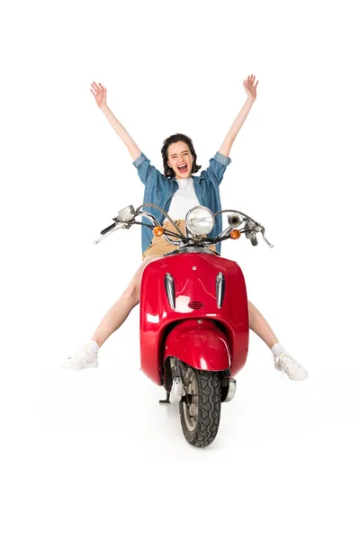 Full length view of girl sitting on red scooter with her hands in air isoalted on white — Stock Photo