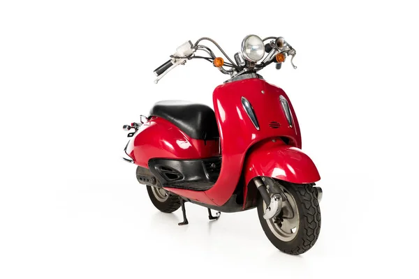 Clean, new, red scooter isolated on white — Stock Photo