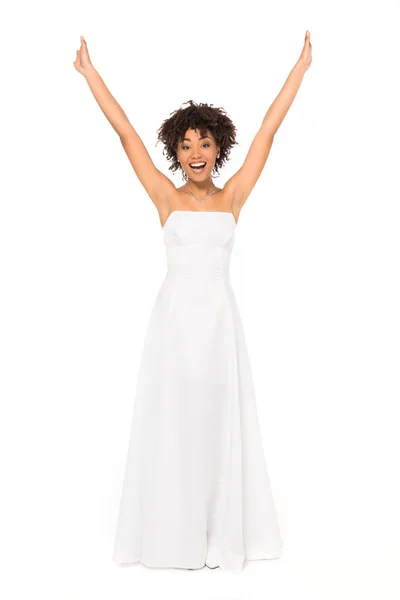 Happy african american bride with hands above head smiling isolated on white — Stock Photo