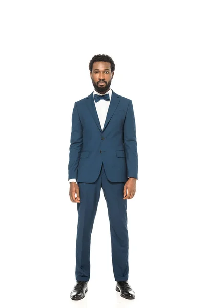 Handsome african american bridegroom standing in groom suit isolated on white — Stock Photo