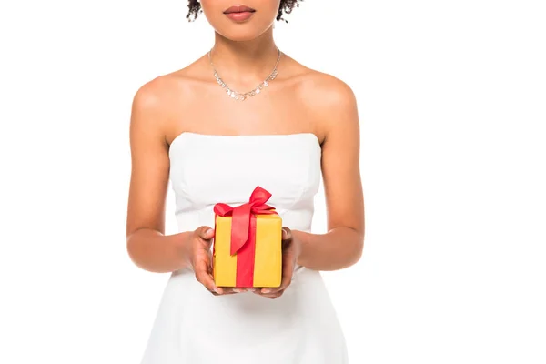 Cropped view of african american bride holding present isolated on white — Stock Photo