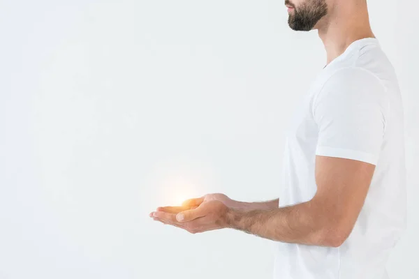 Cropped view of bearded man standing with cupped hands isolated on white — Stock Photo