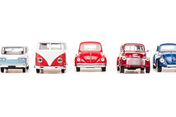 Colorful toy cars and bus on white with copy space — Stock Photo