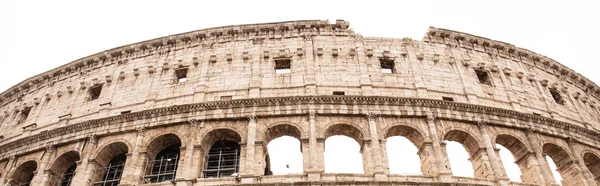 ROME, ITALY - JUNE 28, 2019: panoramic shot of ruins of colosseum — Stock Photo