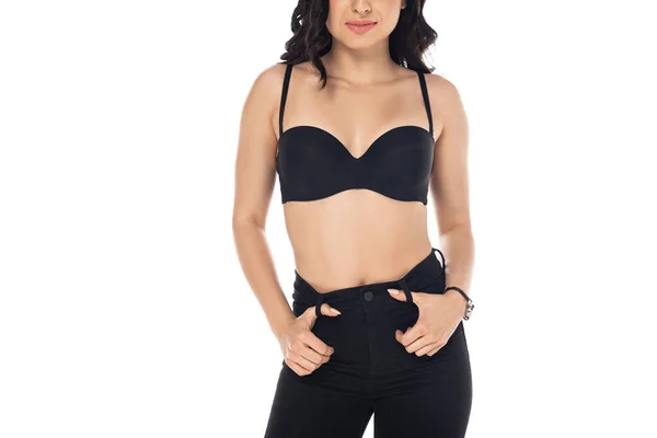 Cropped view of smiling sexy girl in black bra isolated on white — Stock Photo