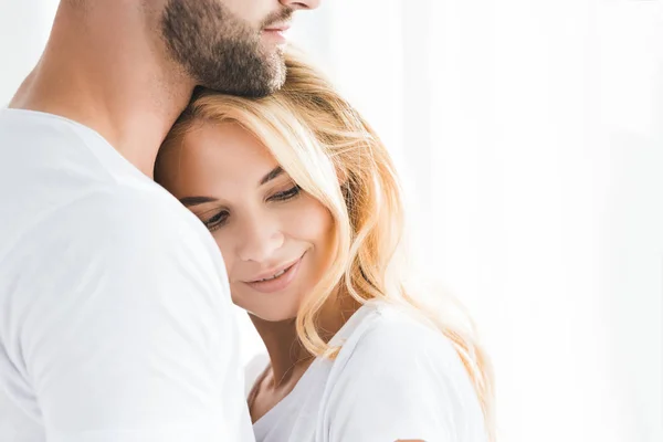 Beautiful blonde woman leaning on bearded man with copy space — Stock Photo