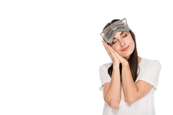 Brunette young woman in cat eye mask sleeping isolated on white — Stock Photo