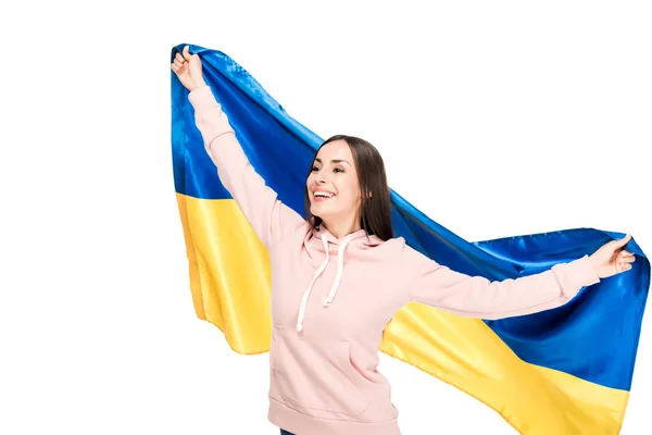 Щаслива молода дівчина тримає прапор України ізольований на білому — стокове фото