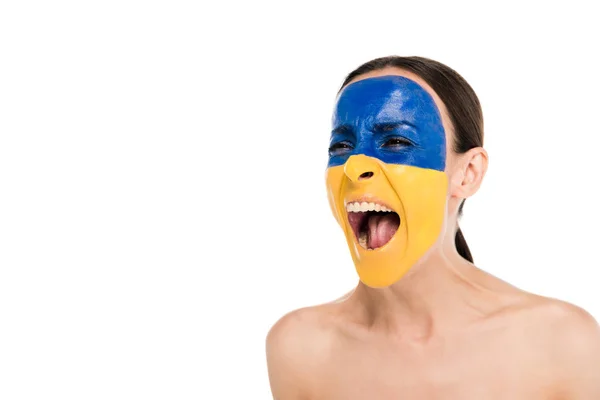 Naked young woman with painted Ukrainian flag on skin screaming isolated on white — Stock Photo