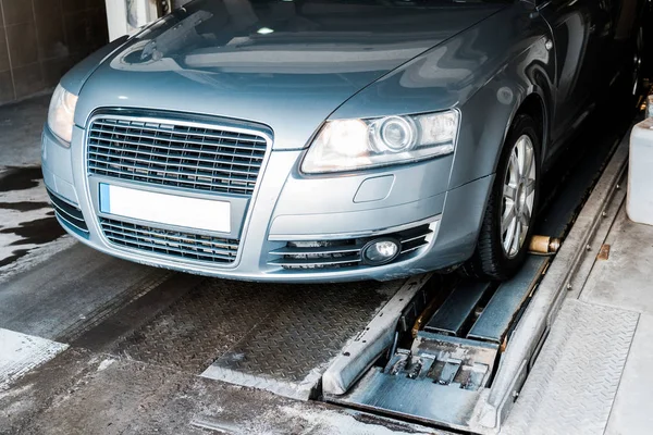 Grey and clean automobile in car wash service — Stock Photo