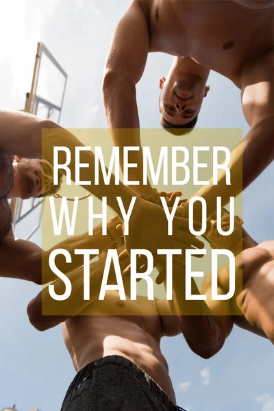 Remember why you started lettering on bottom view of four shirtless sportsmen touching hands — Stock Photo