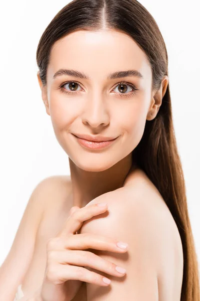 Beautiful young naked woman with perfect skin looking at camera while smiling isolated on white — Stock Photo