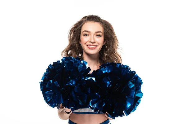 Fröhliches Cheerleader-Mädchen in blauer Uniform mit Bommeln auf weißem Grund — Stockfoto