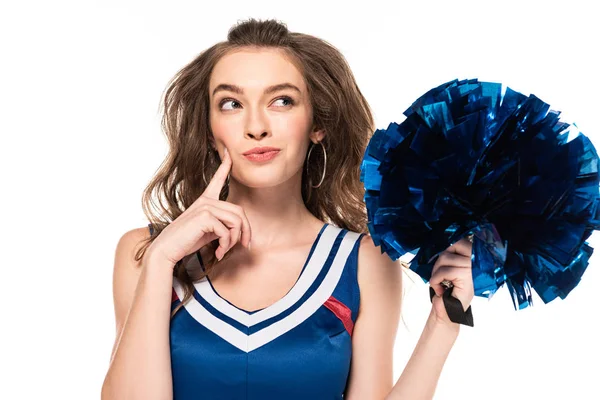 Sognante cheerleader ragazza in uniforme blu con pompon e guardando lontano isolato su bianco — Foto stock