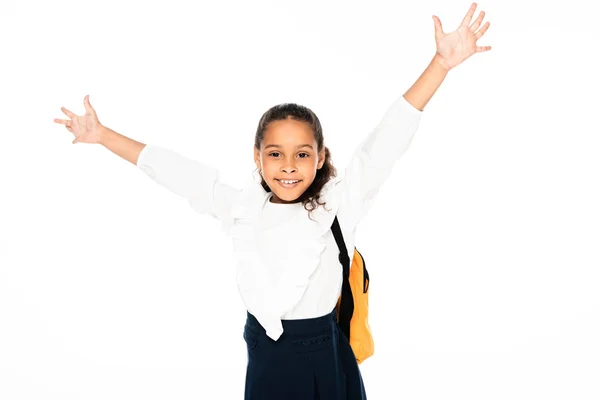 Feliz afroamericano americano colegiala gesto con las manos levantadas mientras mira la cámara aislada en blanco - foto de stock