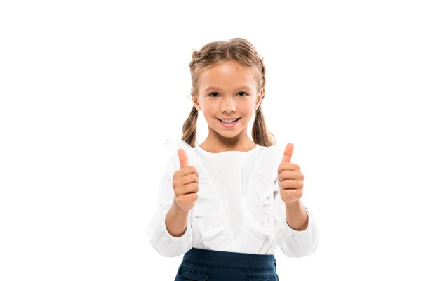 Весела дитина показує великі пальці вгору ізольовано на білому — стокове фото