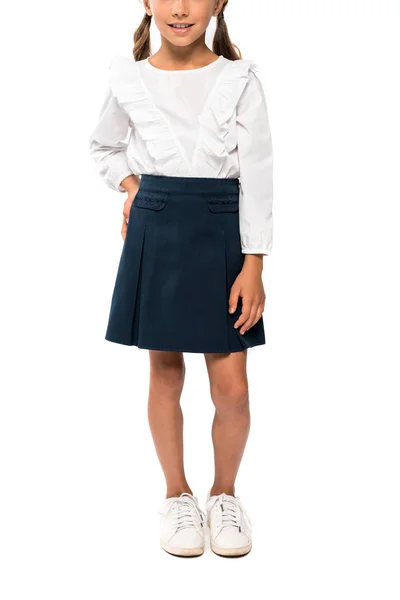 Cropped view of school kid standing with hand on hip isolated on white — Stock Photo