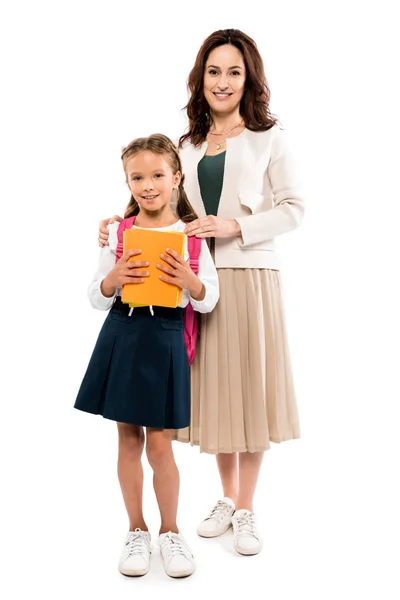 Happy mother standing with daughter isolated on white — Stock Photo