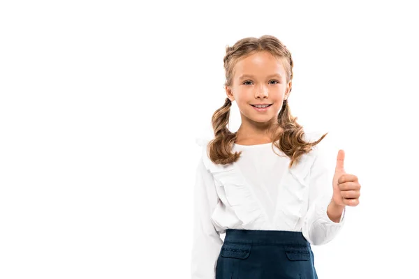 Щасливий школярка показує великий палець вгору ізольовано на білому — стокове фото