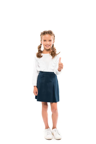 Щасливий школярка показує великий палець вгору на d стоячи ізольовано на білому — стокове фото