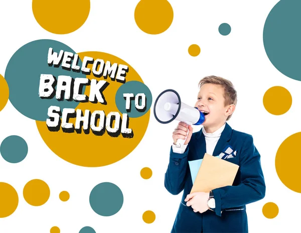 Happy schoolboy with books shouting in megaphone near welcome back to school letters on white — Stock Photo