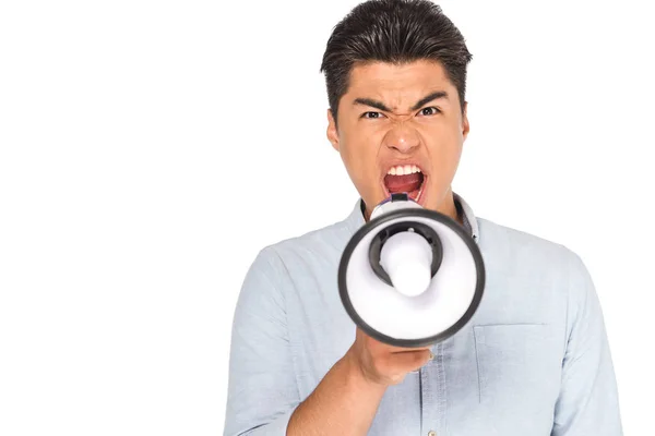 Aggressive asian man screaming into megaphone while looking at camera isolated on white — Stock Photo