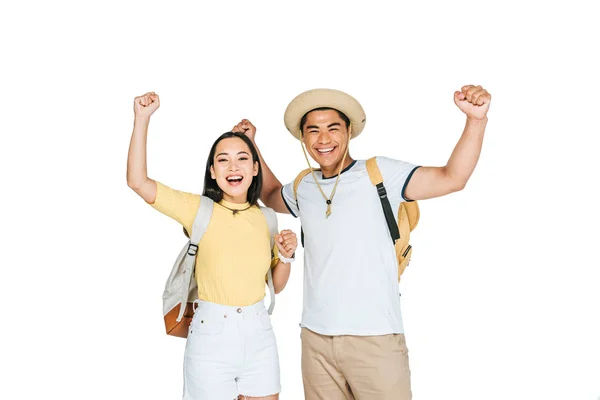 Два щасливих азіатських туристів, що показують так жести, посміхаючись на камеру ізольовані на білому — стокове фото