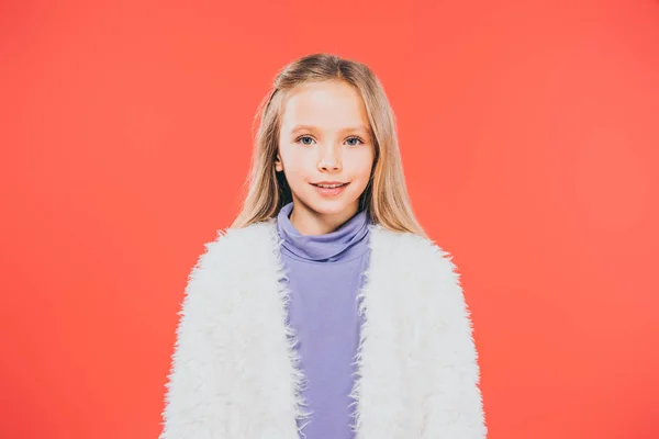 Front view of smiling cheerful kid isolated on red — Stock Photo