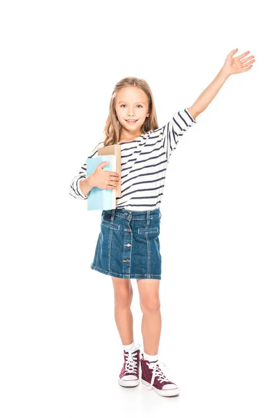 Full length view of smiling kid with books isolated on white — Stock Photo