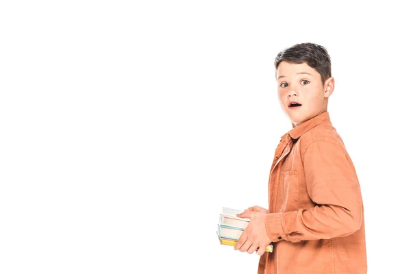 Shocked kid in shirt holding books isolated on white — Stock Photo