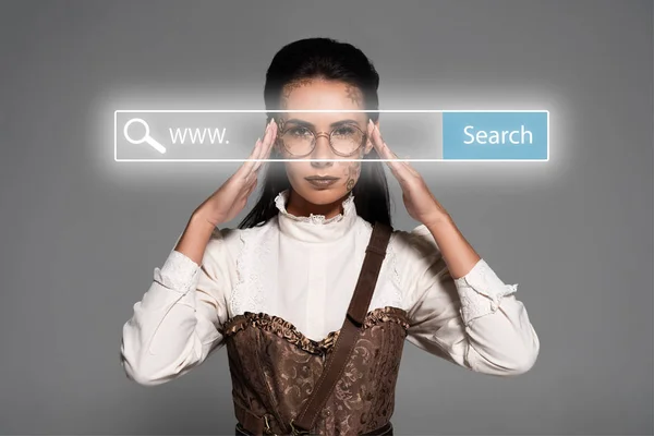 Steampunk woman touching glasses behind search bar digital illustration isolated on grey — Stock Photo