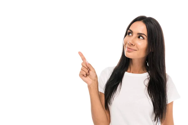 Femme gaie pointant avec le doigt isolé sur blanc — Photo de stock