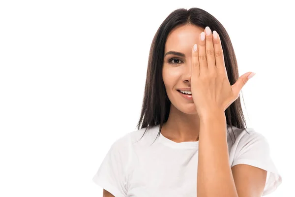 Glückliche Frau bedeckt Gesicht isoliert auf weiß — Stockfoto