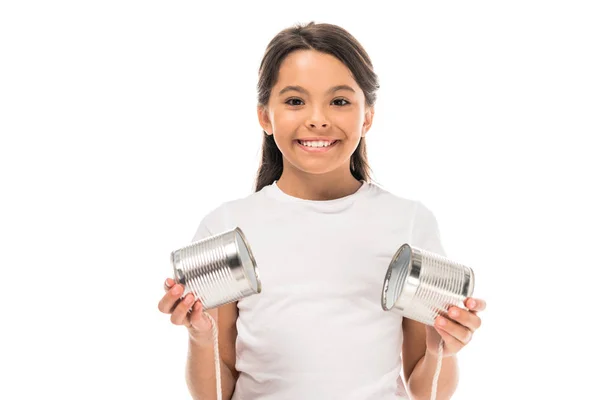 Happy kid holding tin cans isolated on white — Stock Photo