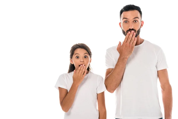 Shocked father and daughter covering faces isolated on white — Stock Photo