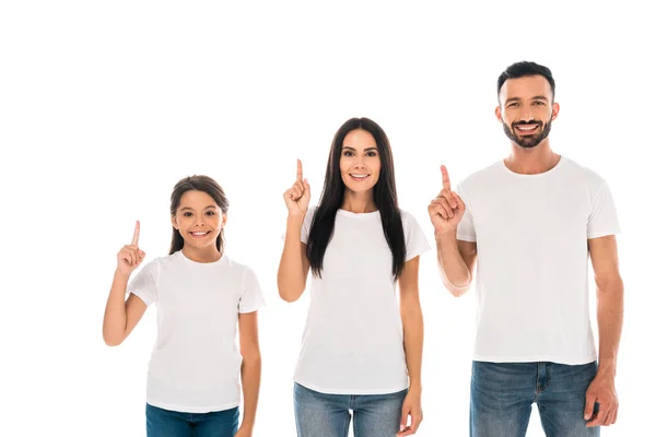 Glückliche Eltern und niedliche Tochter zeigen mit Fingern auf weiß isoliert — Stockfoto